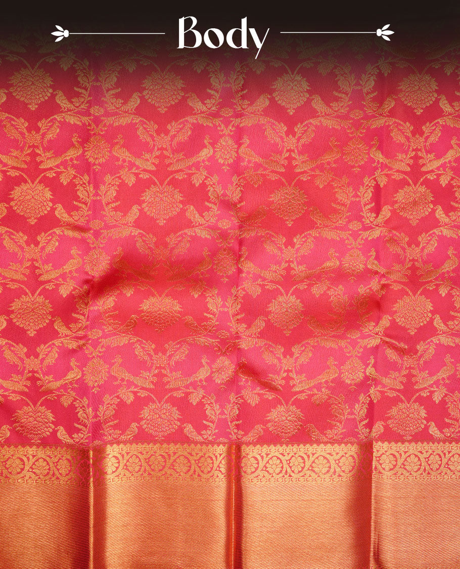 Rani pink colour kancheepuram silk saree featuring gold zari pattern across body, complemented by selfcolour border traditional zari border, paired with matching blouse piece.