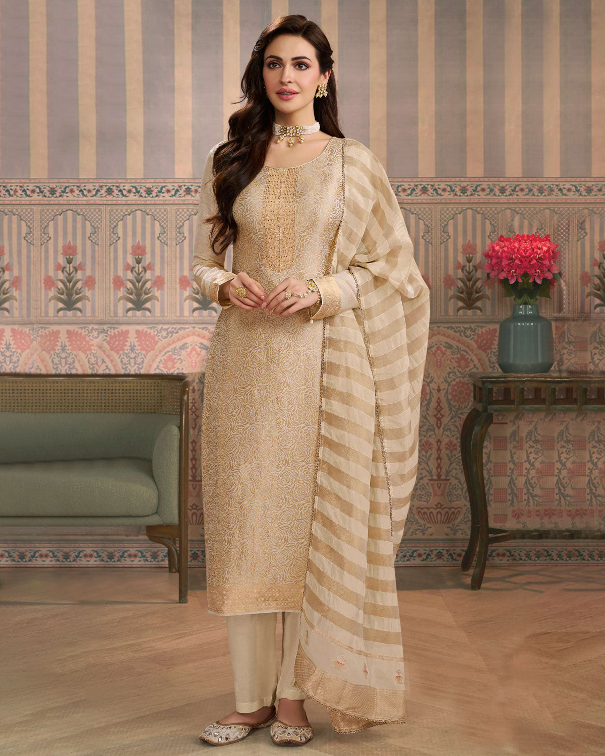 Cream colour silk suit material with Gold zari rose petal pattern and stone work, paired with premium soft santoon bottoms and a silk dupatta detailed with stripped work