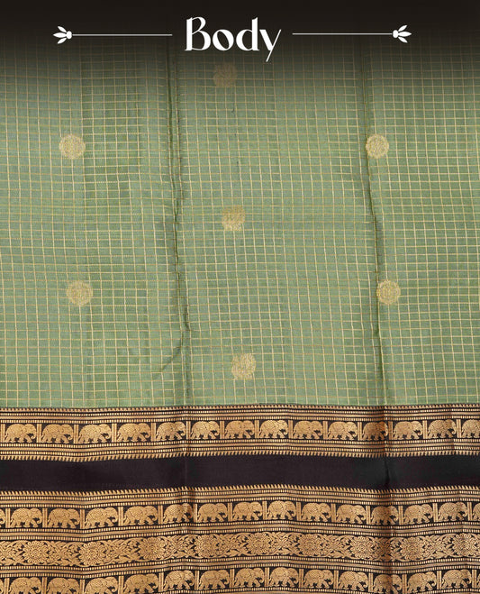 SeaForm Green colour Kancheepuram silk saree featuring Gold zari check with Chakra Motifs on body, complemented by chocolate colour with Traditional border, comes with matching blouse piece.