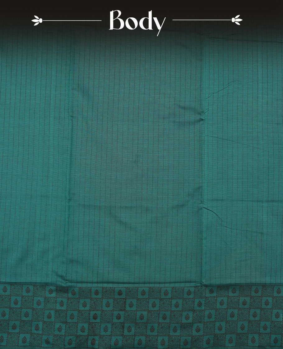 Dark Teal Green colour poly cotton saree with black vertical dotted line pattern on the body, paired with a matching pallu featuring black zigzag geometric border, and a coordinated all‑over black stylised fleur‑de‑lis printed blouse piece.