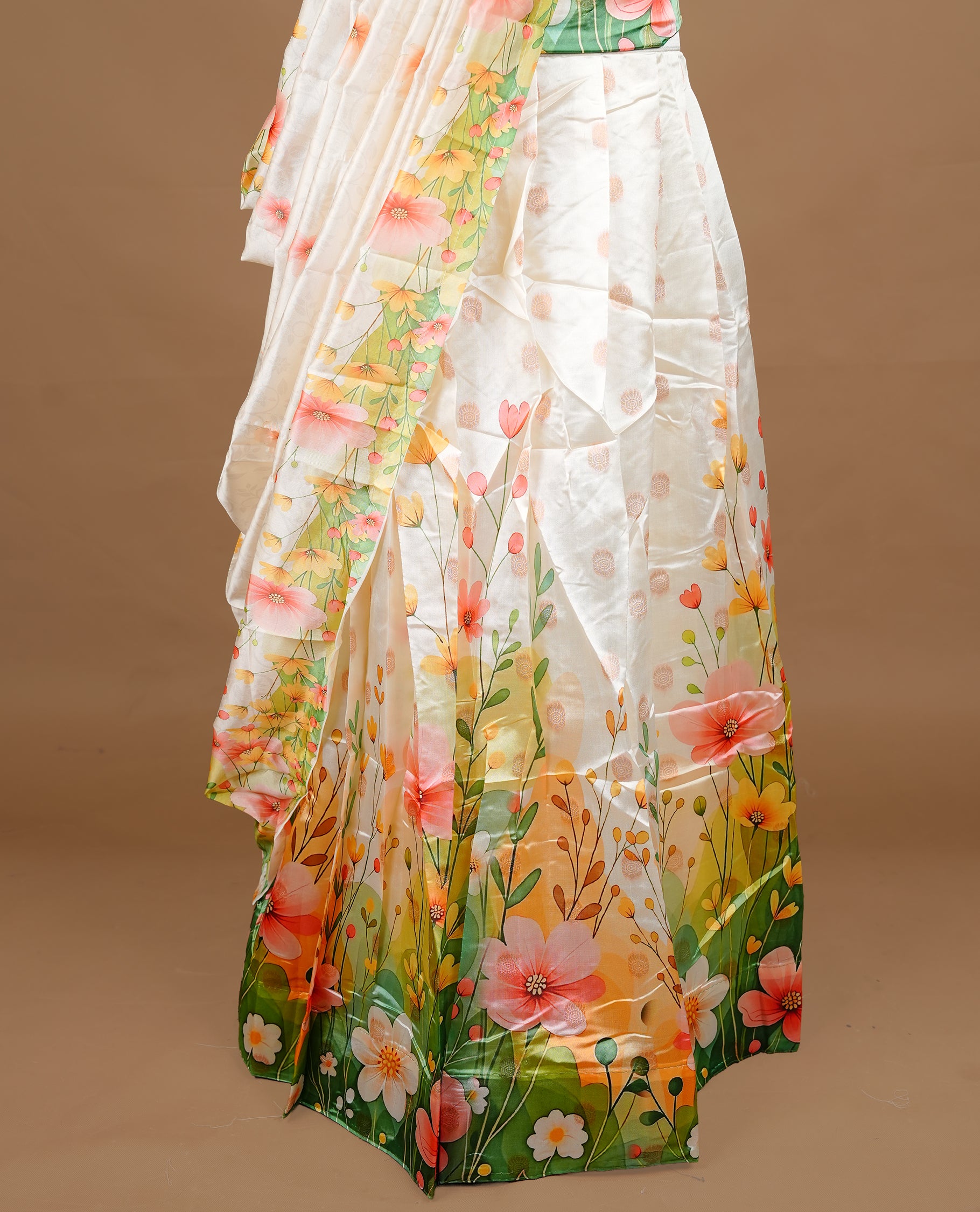 Off white colour semi stitched half saree featuring elegant multicolour floral prints, paired with a vibrant floral border and matching printed dupatta ,paired with matching blouse piece.