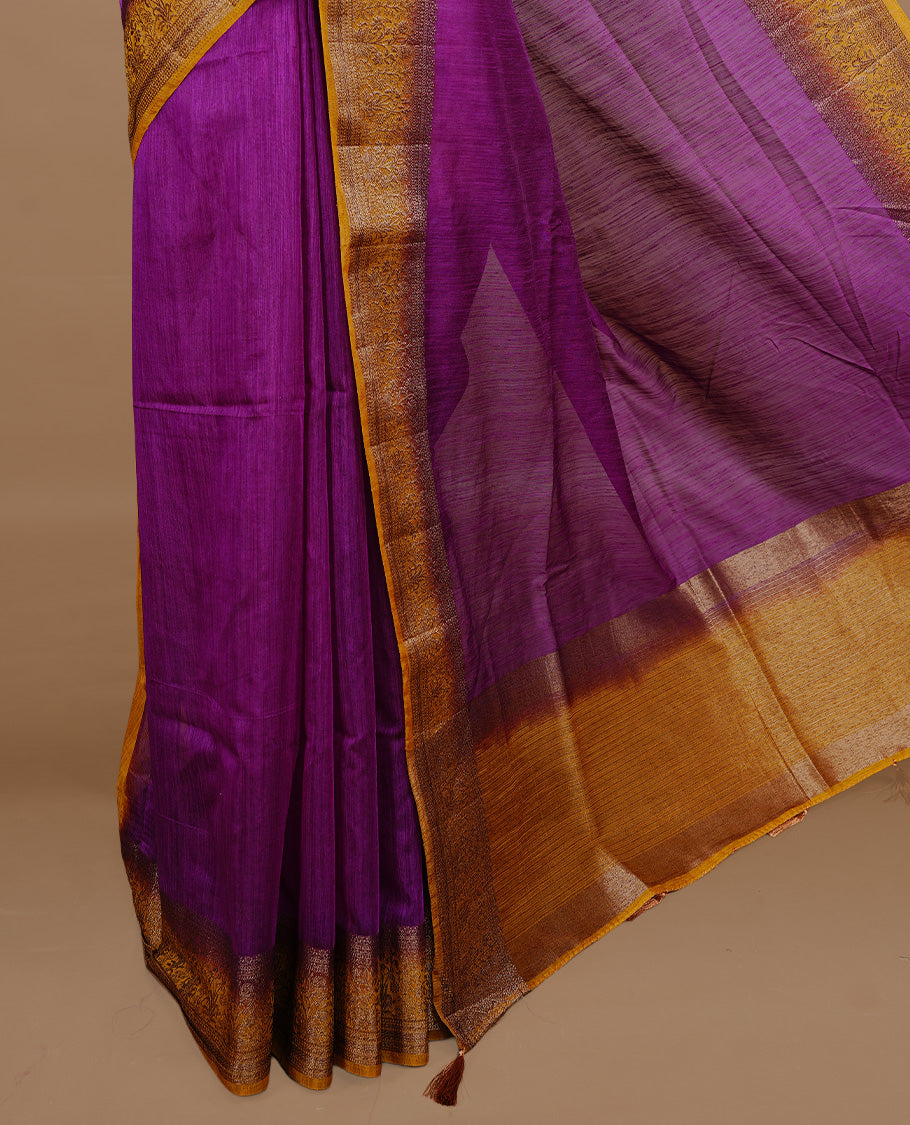 Purple colour Semi linen saree featuring Elegant plain body, complemented by contrast Mustard colour With Antique zari border, paired with matching blouse piece.