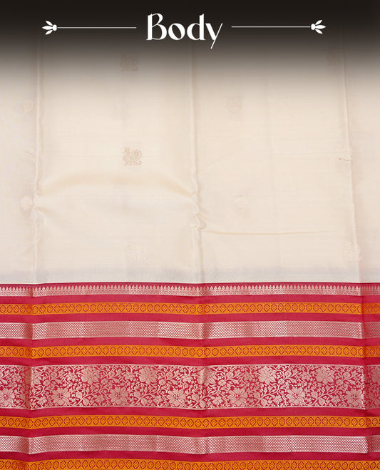 Cream colour kancheepuram silk saree featuring Gold zari peacock Motifs on body, highlight Maroon colour with gold zari & mustard stripe pattern border, paired with a matching blouse piece.
