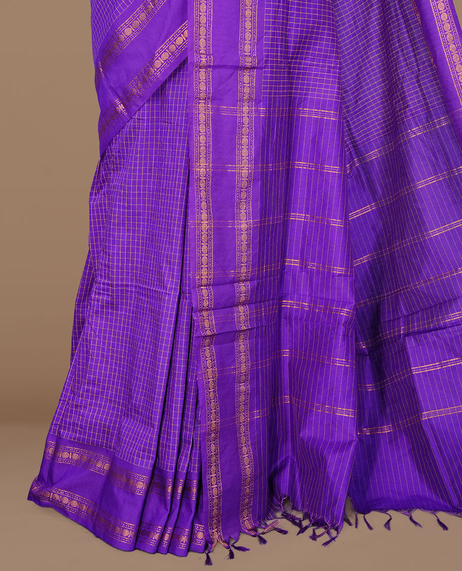 Indigo colour kalyani cotton saree featuring check pattern on body, complemented by self colour with traditional border, paired with matching blouse piece.