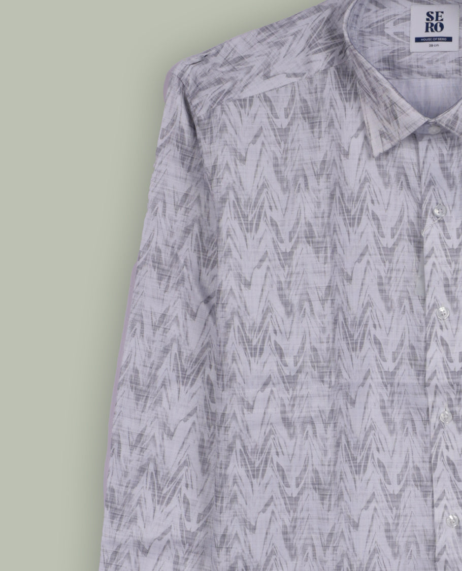 Off white colour shirt shirt featuring a grey printed  subtle zigzag pattern, classic spread collar, and full sleeves, Crafted from soft, breathable fabric for all day comfort.