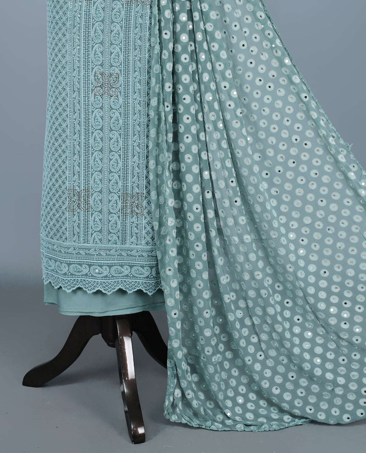 Sea Green Colour Georgette Salwar Material featuring elegant Chikankari work on the kurta, paired with a matching bottom and a sequins-embellished dupatta.