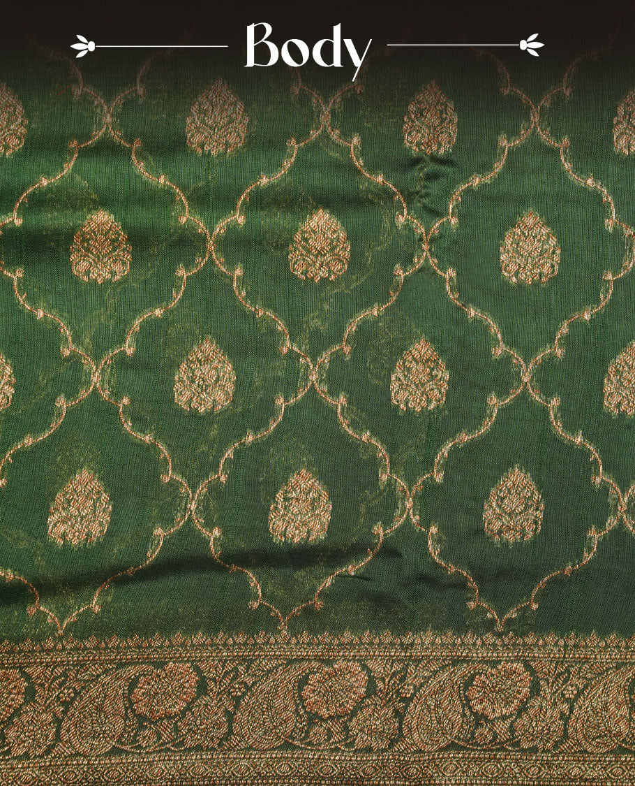 Deep forest green semi Banaras saree with gold zari buta motifs, finished with a traditional gold zari border and pallu, paired with a matching blouse.