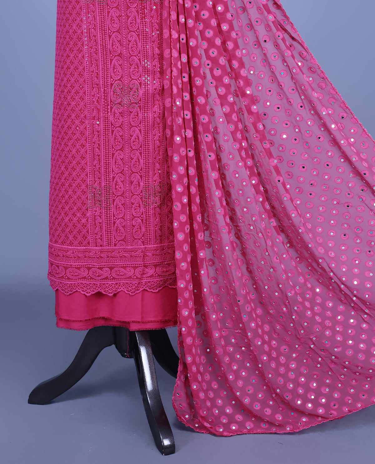 Magenta Colour Georgette Salwar Material featuring elegant Chikankari work on the kurta, paired with a matching bottom and a sequins-embellished dupatta.