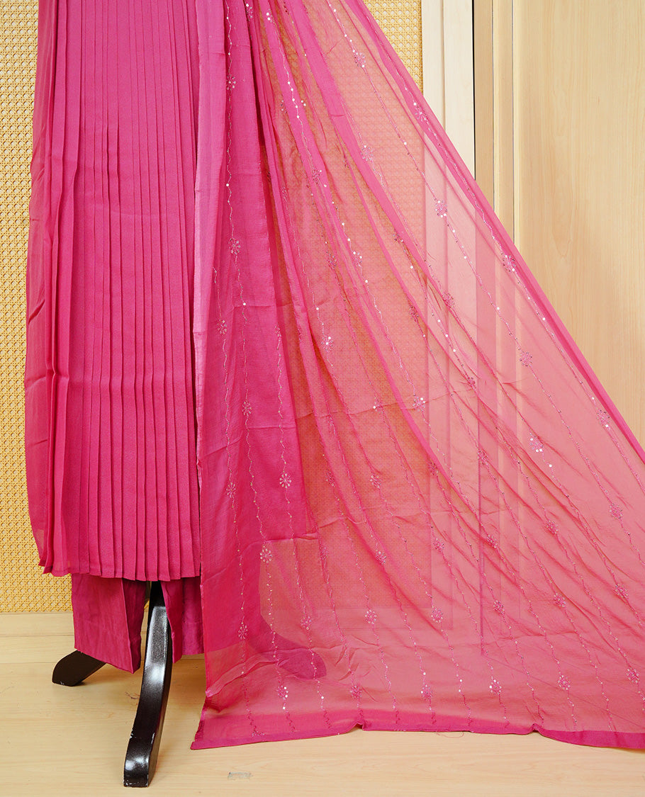 Mauve pink colour pleated churidar set featuring intricate bead and sequin embroidery on the yoke, paired with matching solid pants and dupatta.