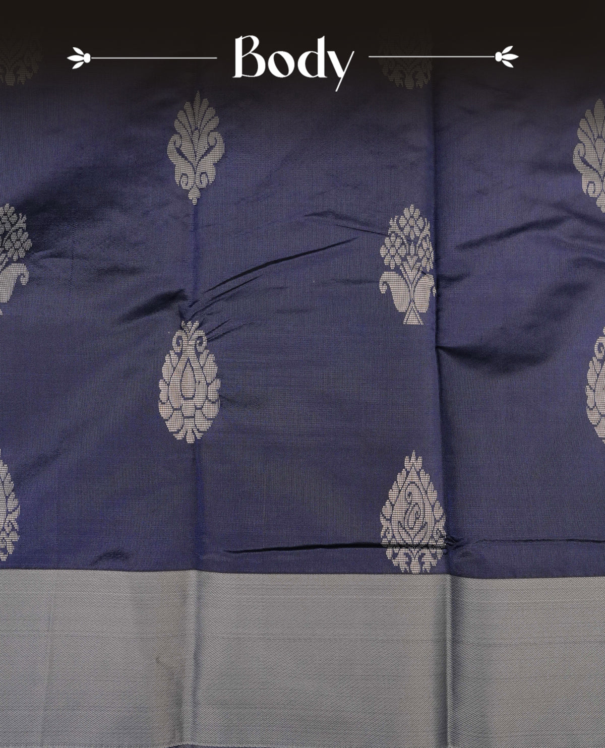 Navy blue colour silk cotton saree featuring ash colour thread motifs on body thread detiled contrast borders & pallu,comes with matching blouse piece