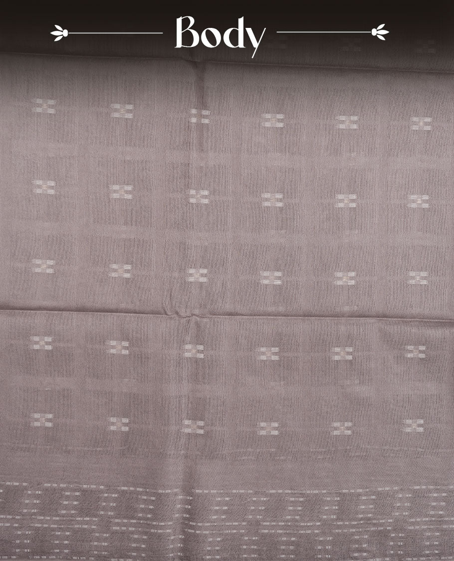 Gray colour semi jute saree highlighting white thread motifs on body, without border and paired with matching blouse.