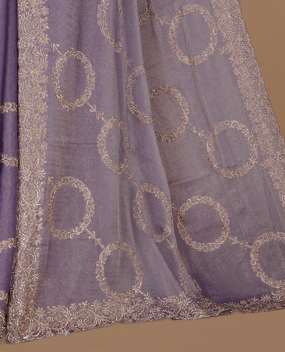 Lavender colour organza saree featuring thread & gold stone pattern on body, highlighting scalp border, paired with matching blouse piece.