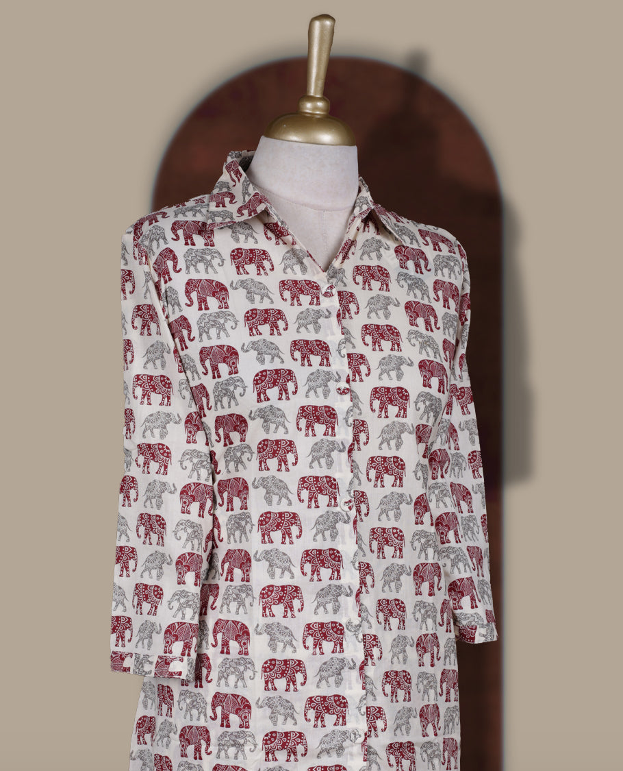 Off white colour cotton coord set featuring charming elephant prints all over, Designed with a classic shirt collar and 3/4 sleeves, paired with matching straight pants for a trendy, relaxed, and comfy everyday look.