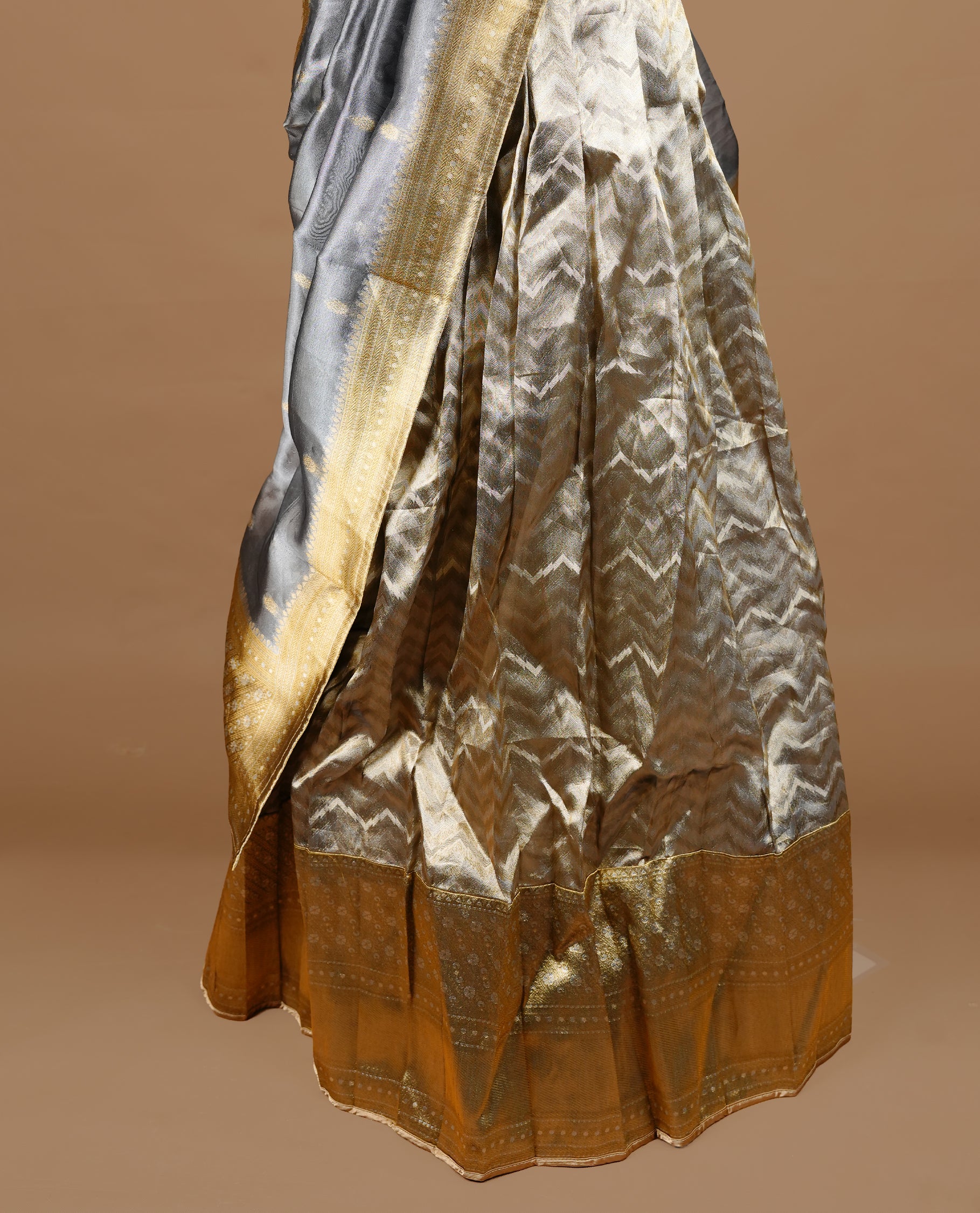 Antique gold colour semi stitched Half saree featuring contrast gold colour with traditional zari border skirt, paired with matching zari border dupatta,stitched blouse piece