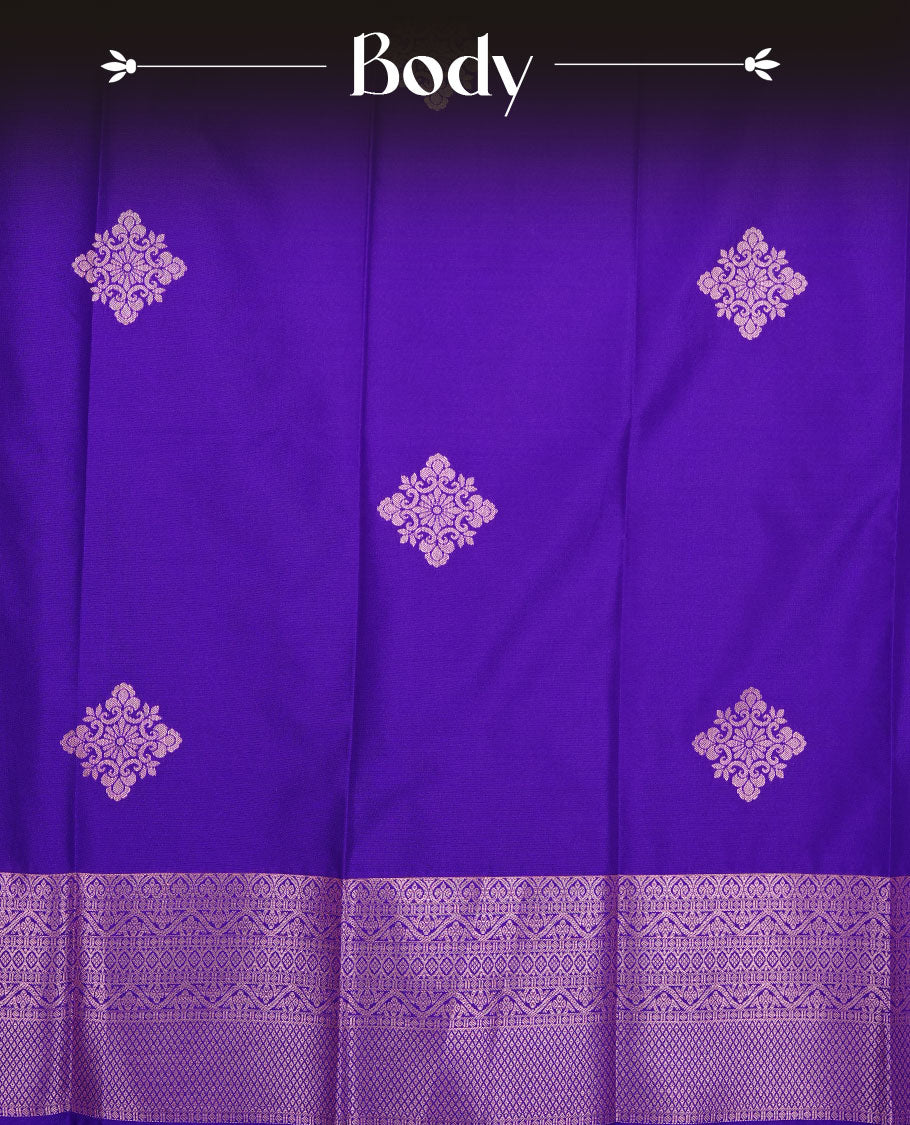 Indigo colour soft silk saree featuring rose Gold zari motifs on body, complemented by self colour with traditional border, paired with matching blouse piece.