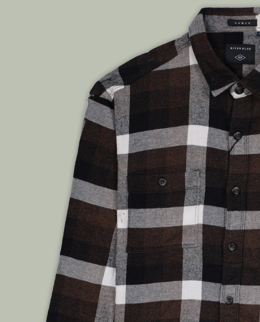 Brown, black, and white checked shirt featuring a classic collar and full sleeves, Crafted from soft fabric for comfort, its a versatile piece perfect for both casual outings and relaxed office wear.