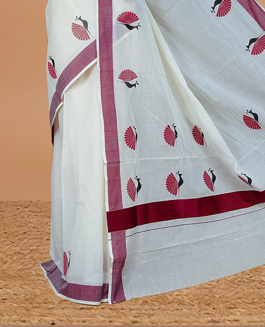 Cream colour Cotton Kerala saree Featuring Classy Plain body for Effortless Elegance, enhancing Maroon with Peacock Printed border, paired with matching blouse piece.
