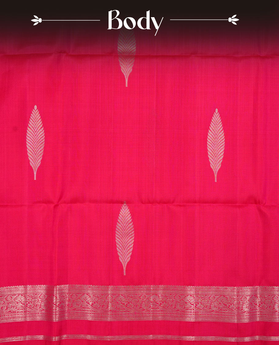 Rani pink colour soft silk saree featuring gold zari motifs on body, complemented by self colour with traditional border with tassel at pallu, paired with matching blouse piece.