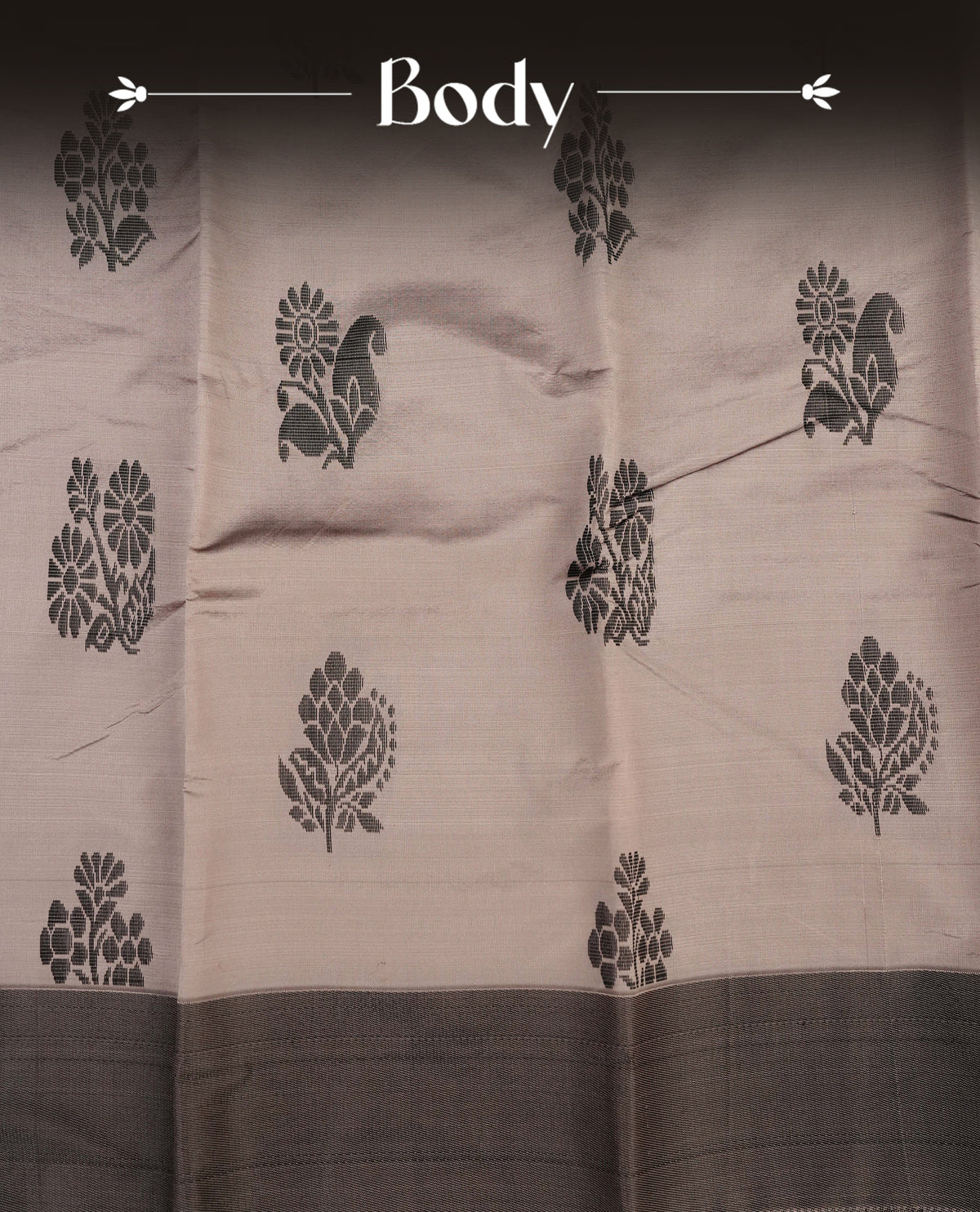 Light grey silk cotton saree featuring dark grey colour thread motifs on body thread detiled contrast borders & pallu,comes with matching blouse piece