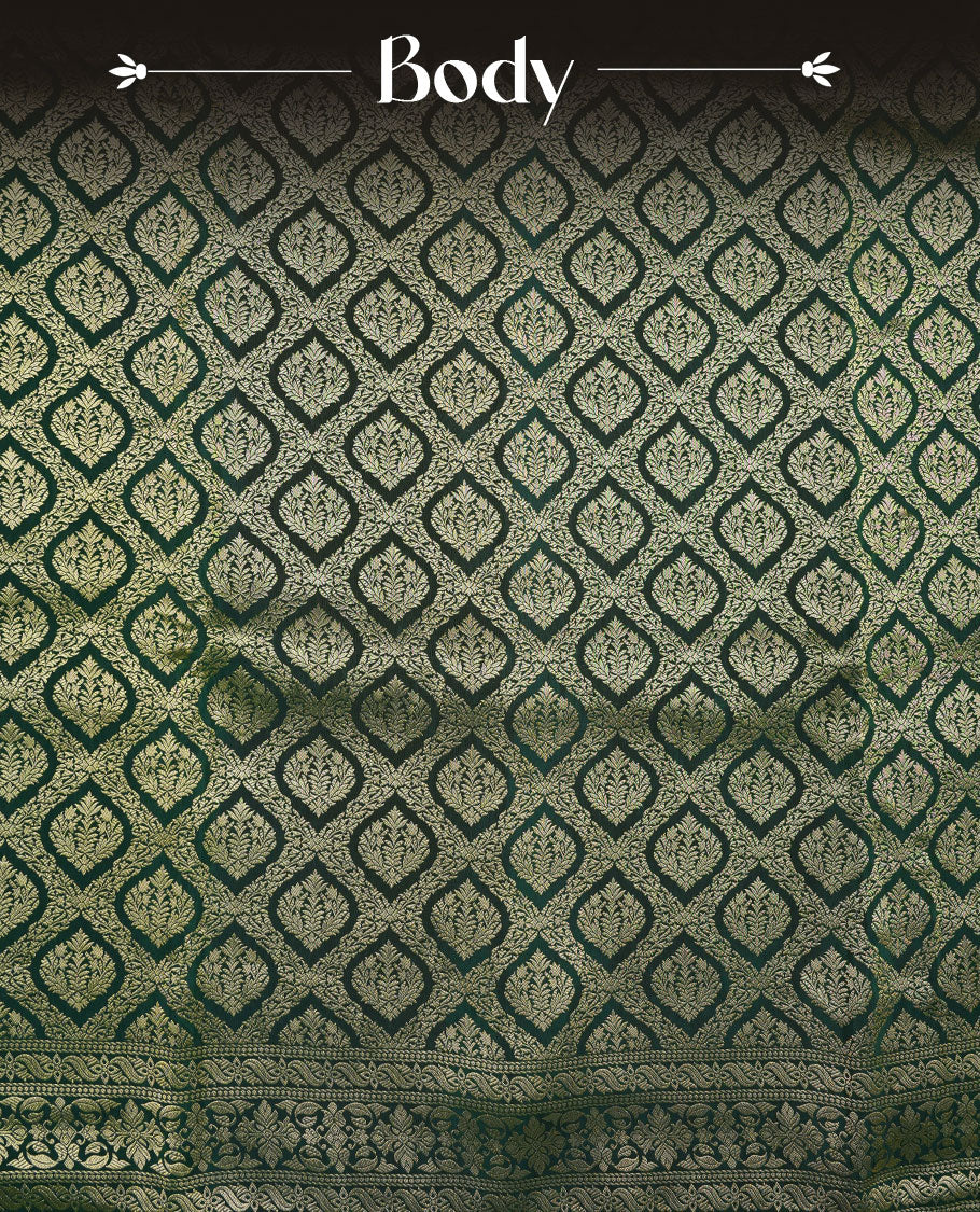 Dark green colour banaras satin crepe saree featuring gold zari pattern across body, with self colour border with gold zari pattern and paired with matching blouse.