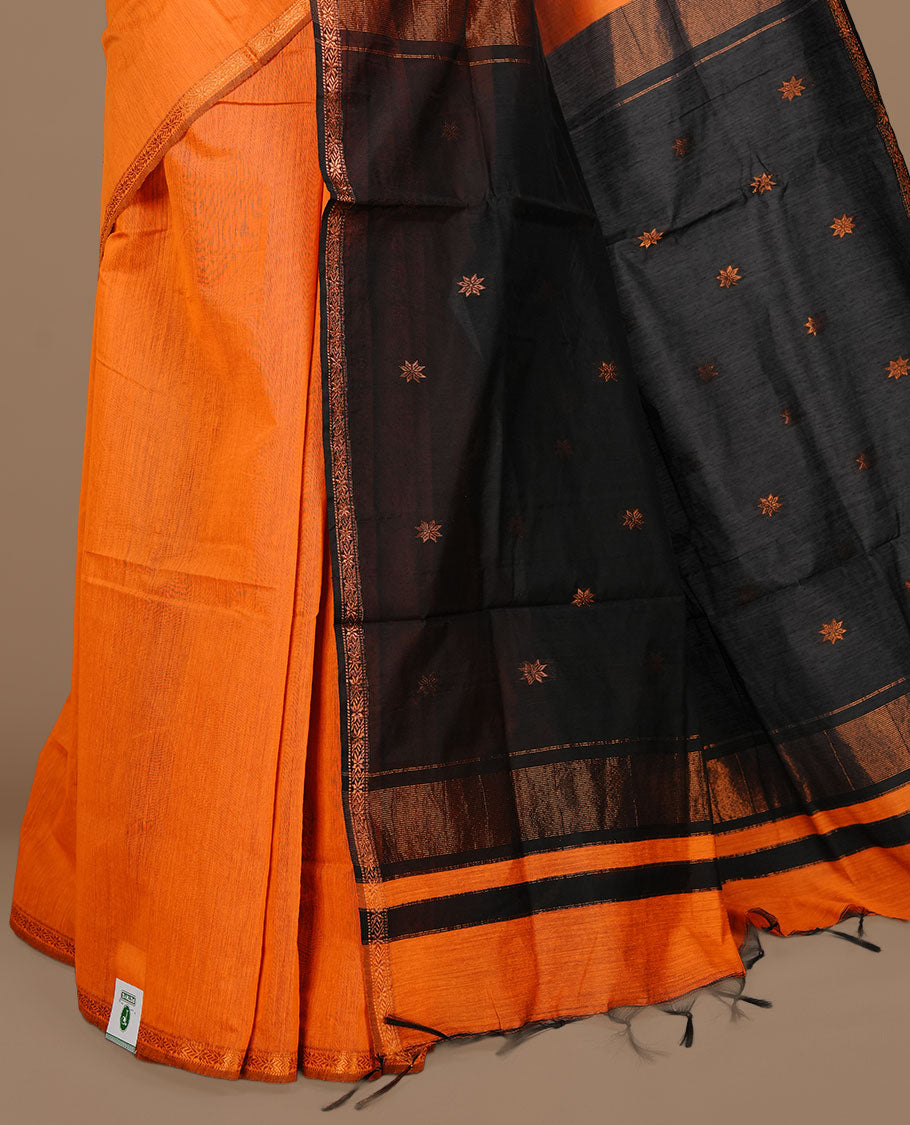 Orange colour Maheshwari cotton saree features elegant gold zari motifs across the body, a classic gold zari border, a striking contrast pallu, and a matching blouse piece.