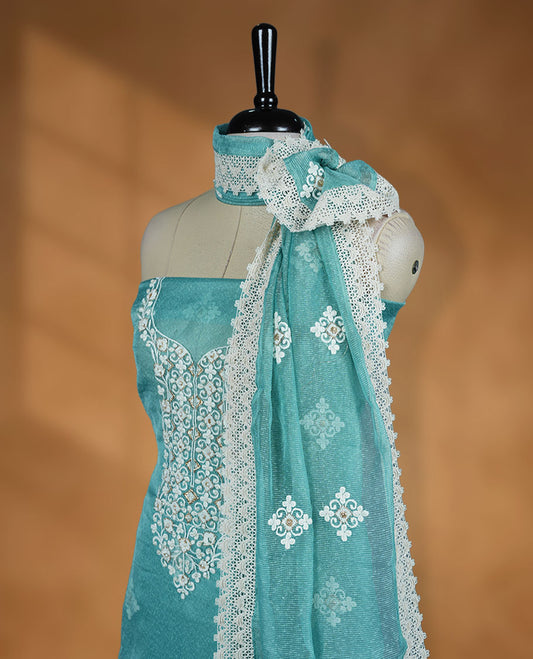 Teal blue colour churidar set with off white thread embroidery and pearl detailing, paired with cotton matching pant and dupatta.