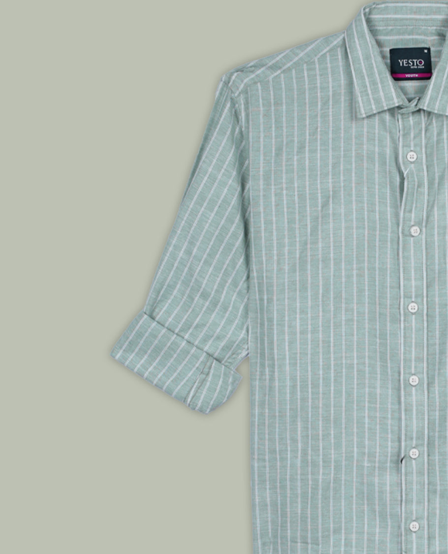 Pastel green and white colour striped shirt in soft cotton, featuring vertical lines for a sleek, timeless look, Designed with a classic collar and full sleeves, it blends effortless style with everyday comfort.