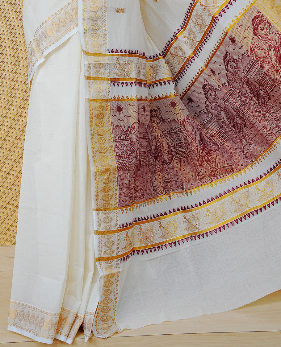 Cream Colour Cotton Kerala Saree Featuring Gold Buttas on the Body, a Classy Gold Zari Border, and a Traditional Maroon Colour Lord Krishna Thread work and Gold Zari Pallu, Paired with a Matching Blouse Piece.