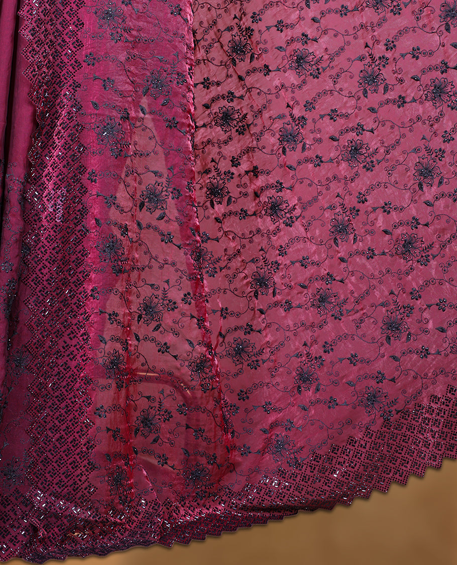Burgundy colour velvet chiffon designer saree, featuring black thread embroidery kodi pattern on body with black cut stone work and heavy stone border, pallu and Paired with matching blouse.