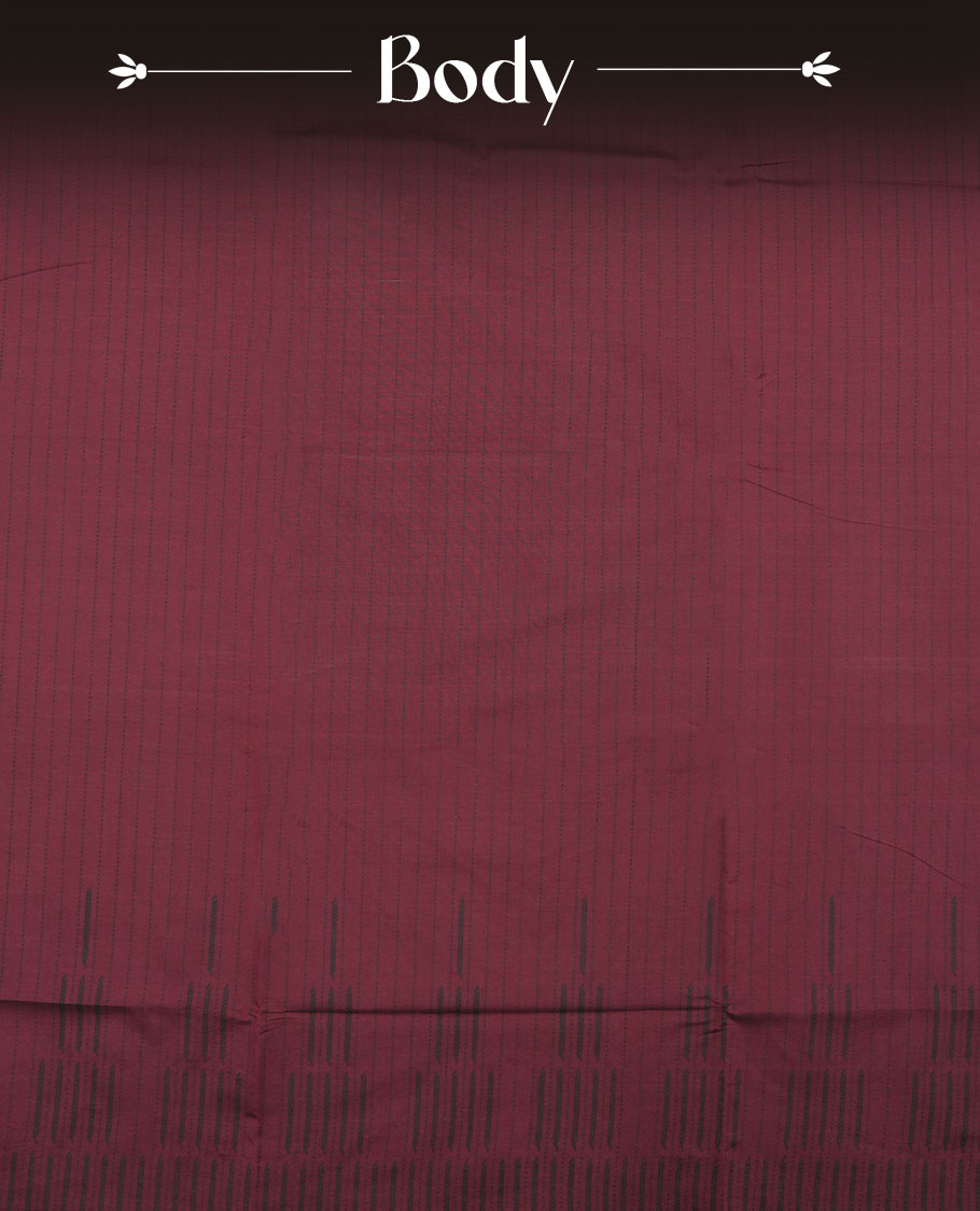 Dark Maroon colour poly cotton saree with black vertical dotted line pattern on the body, paired with a matching pallu featuring black zigzag geometric border, and a coordinated all‑over black stylised fleur‑de‑lis printed blouse piece.