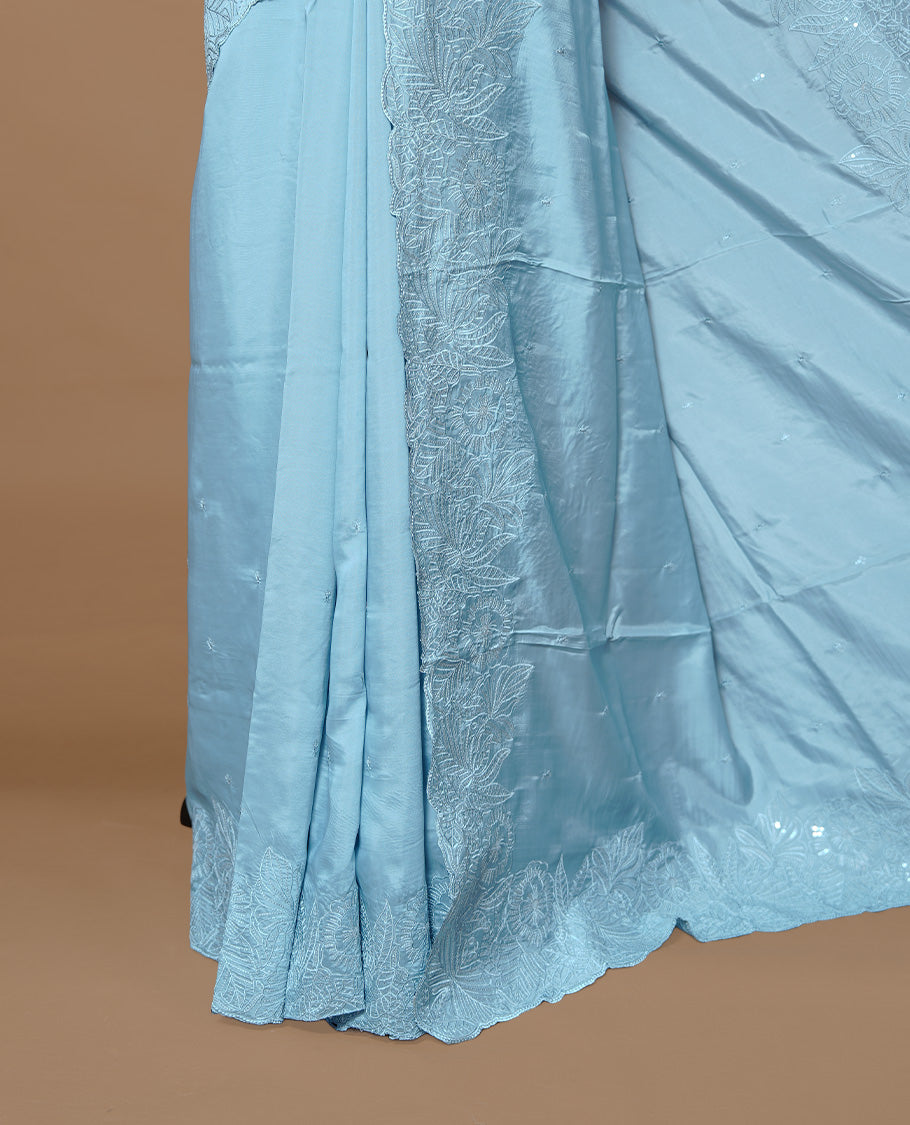Pastel Blue colour Designer saree featuring Elegant Thread & Sequins body, complemented self colour thread & Sequins scalp border, paired with matching blouse piece.