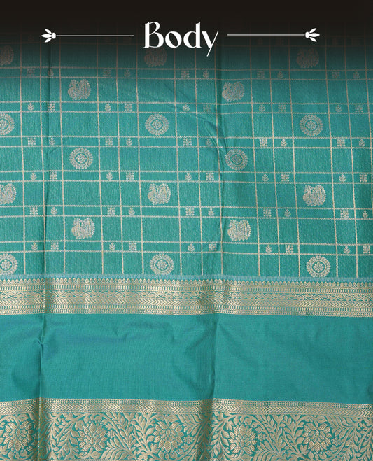 Aqua colour semi wedding silk saree featuring gold zari checks with motifs on body,contrast self colour with traditional border on body, rich pallu comes with matching blouse piece
