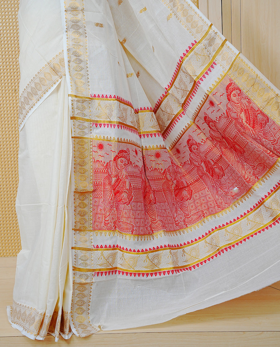 Cream Colour Cotton Kerala Saree Featuring Gold Buttas on the Body, a Classy Gold Zari Border, and a Traditional Red Colour Lord Krishna Thread work and Gold Zari Pallu, Paired with a Matching Blouse Piece.