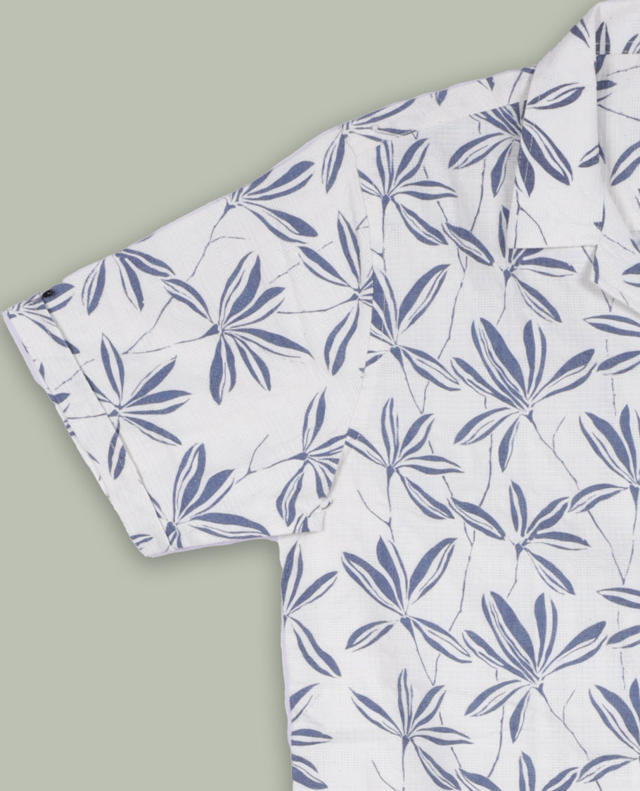 Off white colour short sleeve shirt features a rounded spread collar and a greyish blue colour jacquard print all over & its ideal for both casual days and laid back evenings.