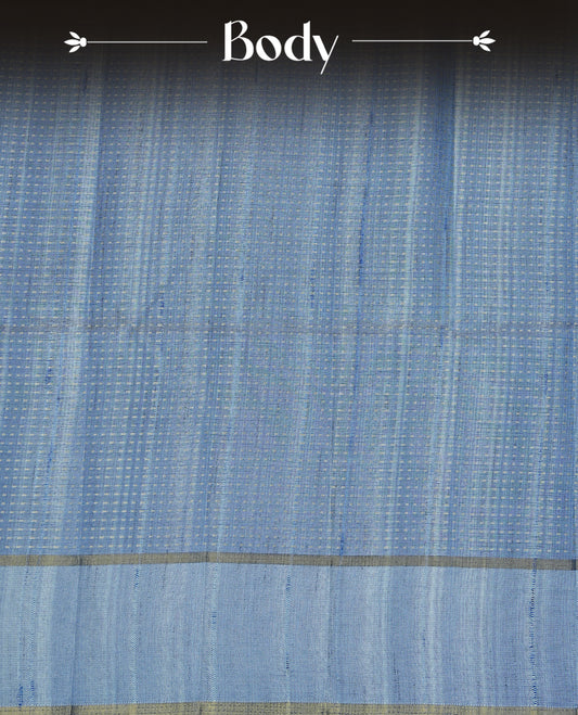 Steel blue colour semi tussar silk saree featuring elegant gold zari dotted stripes across the body, enhanced with a rich zari woven border. Comes with a matching blouse piece.