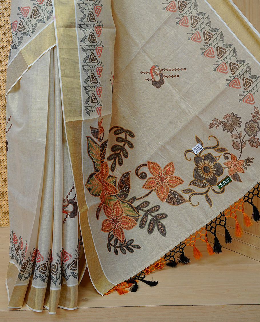 Cream Colour Tissue Kerala  Saree Featuring A Digital Floral Printed Body, Highlighted With Classy Gold Zari Border Black & Yellow Tassel At Pallu, Paired With A Matching Blouse Piece.