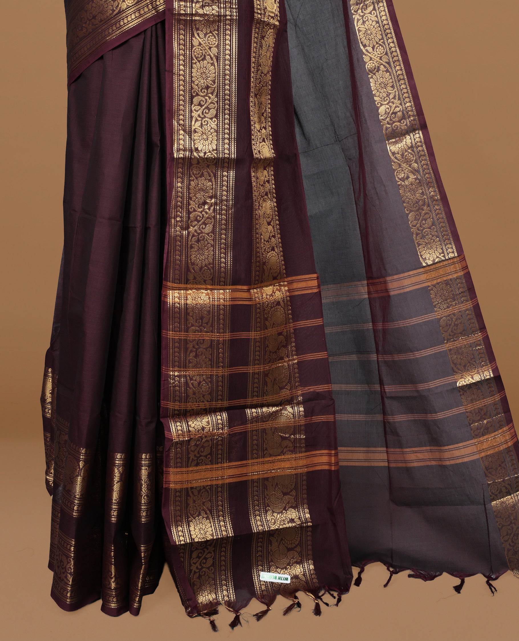 Chocolate Brown colour Chettinad cotton saree featuring Elegant plain body , complemented by self colour with zari border, comes with matching blouse piece.