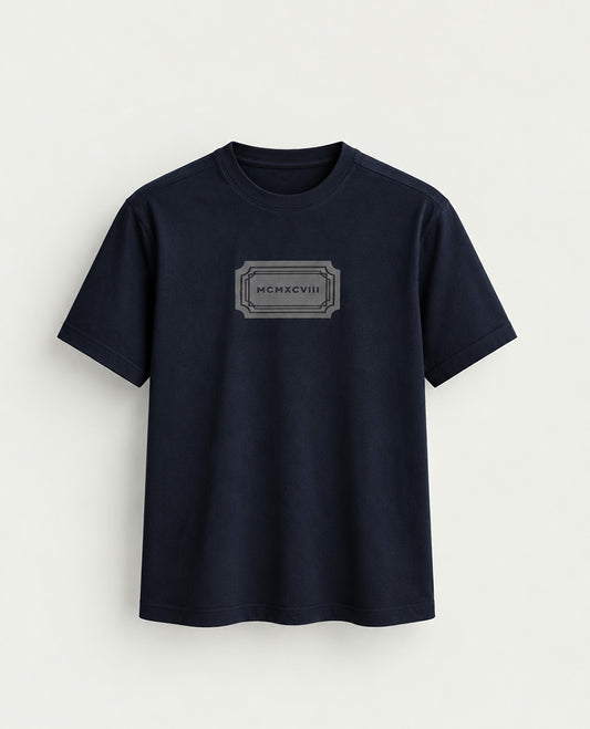 Dark Blue colour Tshirt featuring Round neck, Text on body and Half sleeve.