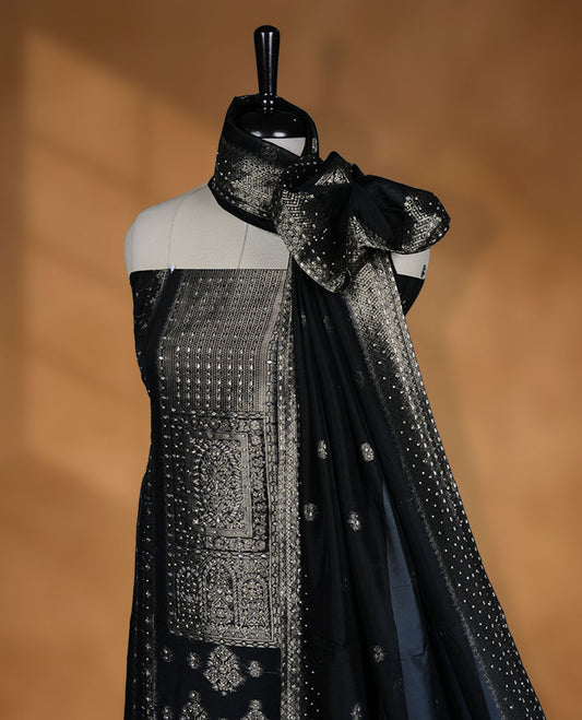 Black colour semi silk salwar material banarasi design highlighting stone work and dupatta, matching plain bottom