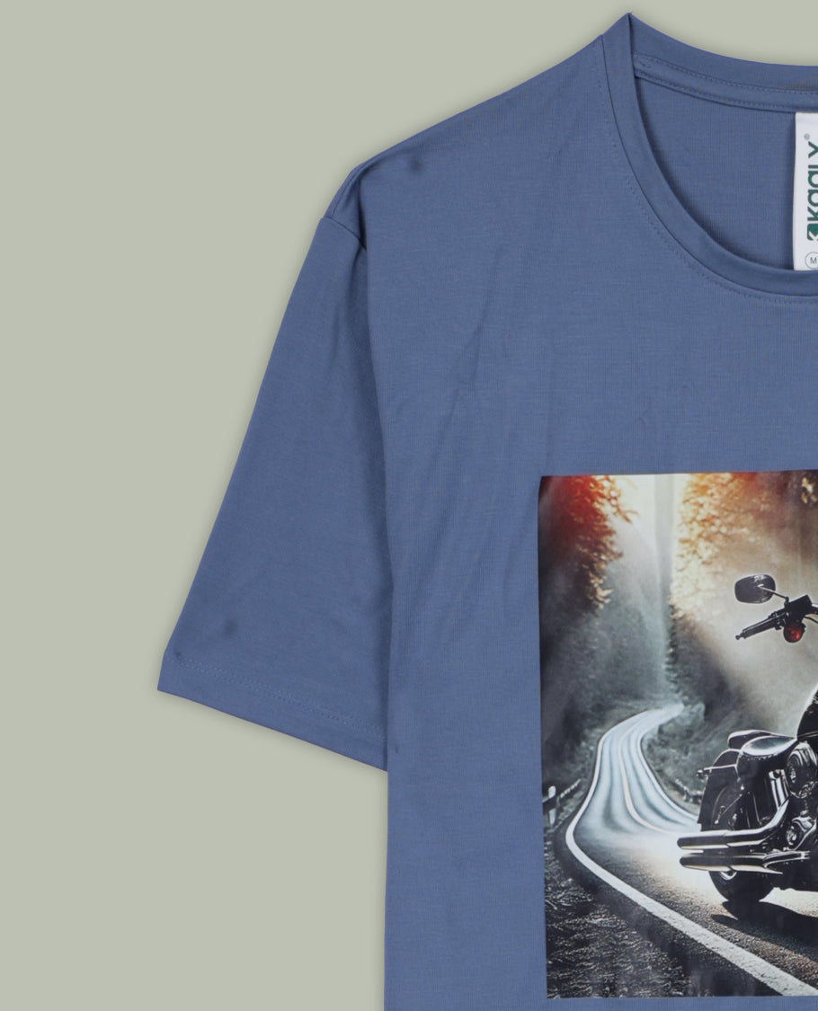 Greyish blue colour T shirt featuring a multicolour graphic print & designed with a classic round neck and short sleeves,made from soft breathable fabric for a comfortable and stylish everyday look.