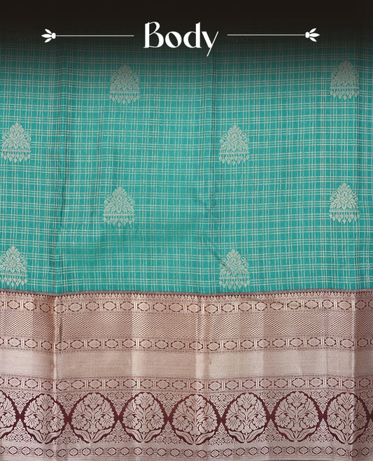 Green colour semi wedding saree featuring gold zari check with  motifs on body complemented by contrast chocolate colour with traditional border, comes with matching blouse piece.