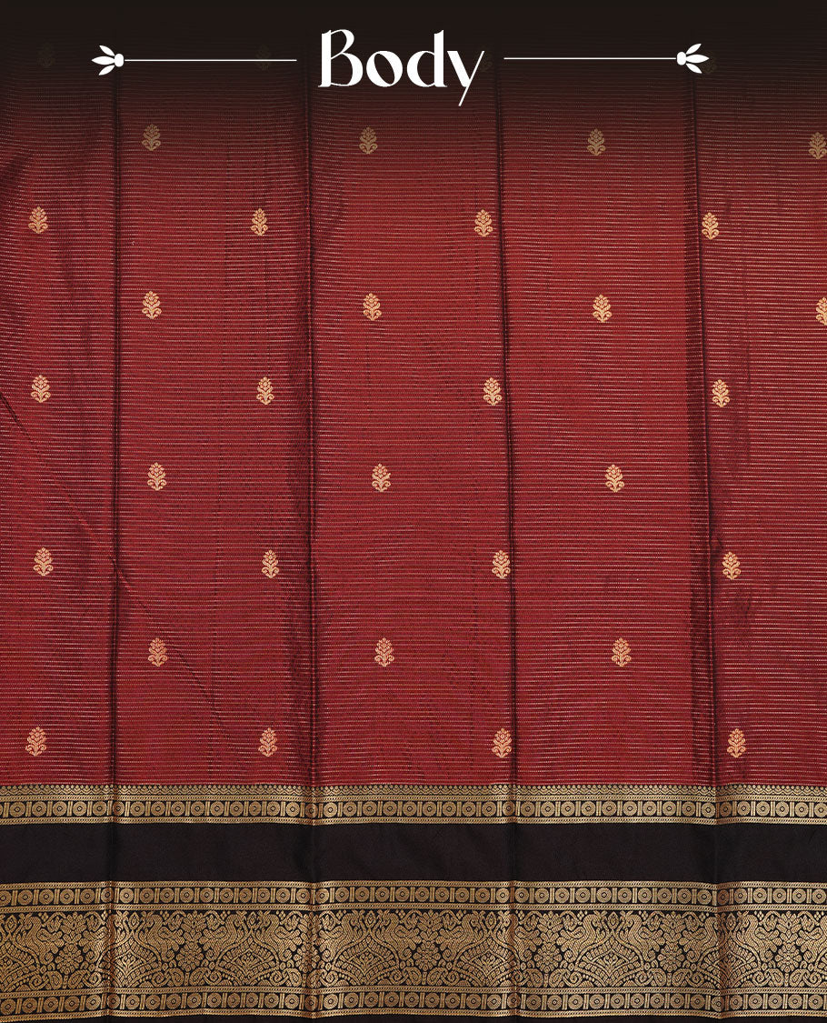 Maroon colour soft silk saree featuring gold zari check & motifs on body, complemented by contrast dark chocolate colour with zari border, paired with matching blouse piece.