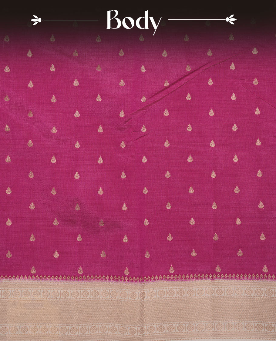 Dark Pink colour tussar saree featuring litte gold zari motifs on body, contrast cream colour border and pallu with zari woven design, comes with matching blouse piece.
