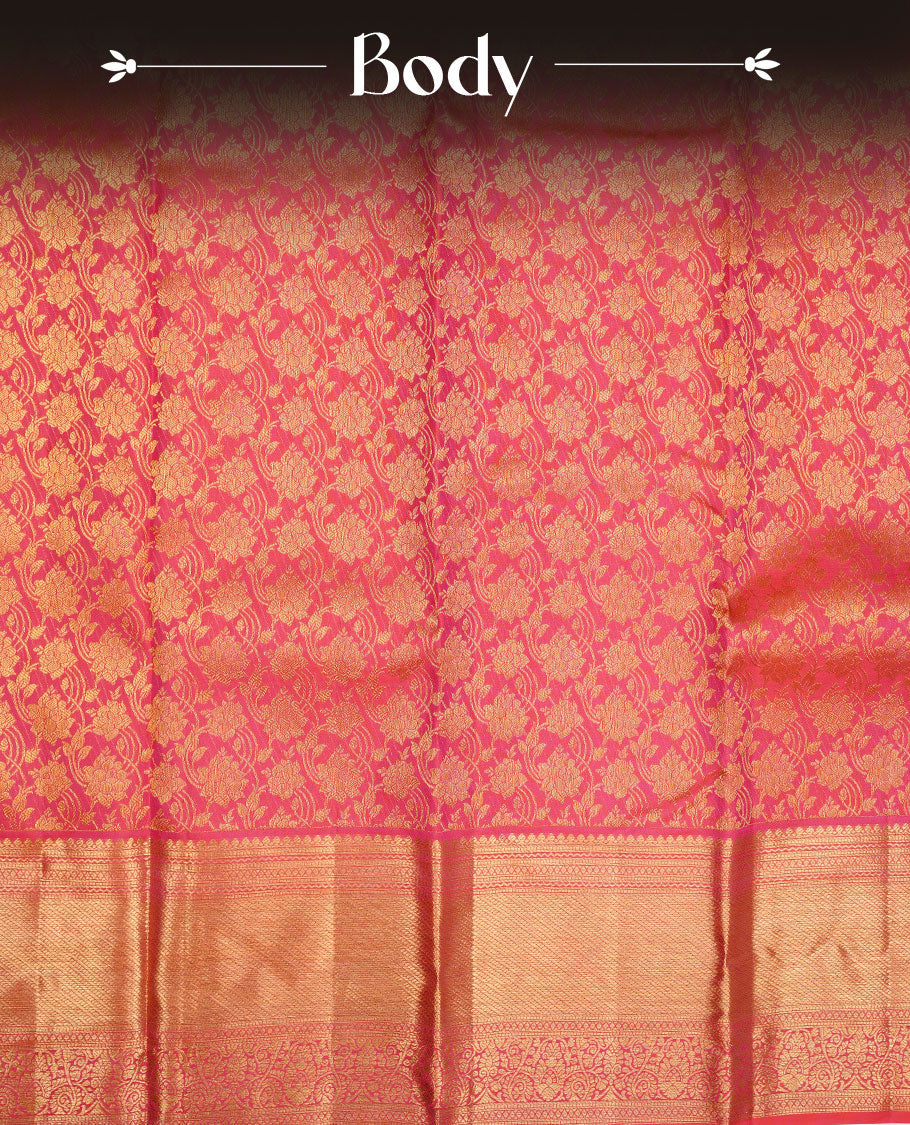 Rasberry colour kancheepuram silk saree featuring gold zari pattern across body, complemented by selfcolour border traditional zari border, paired with matching blouse piece.