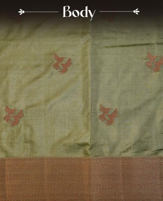 Olive colour semi banaras tussar silk saree highlighting gold zari bird motifs on body, complemented by self colour with antique zari border, paired with matching blouse piece.