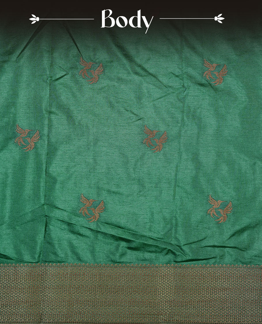 Green colour semi banaras tussar silk saree highlighting gold zari bird motifs on body, complemented by self colour with antique zari border, paired with matching blouse piece.