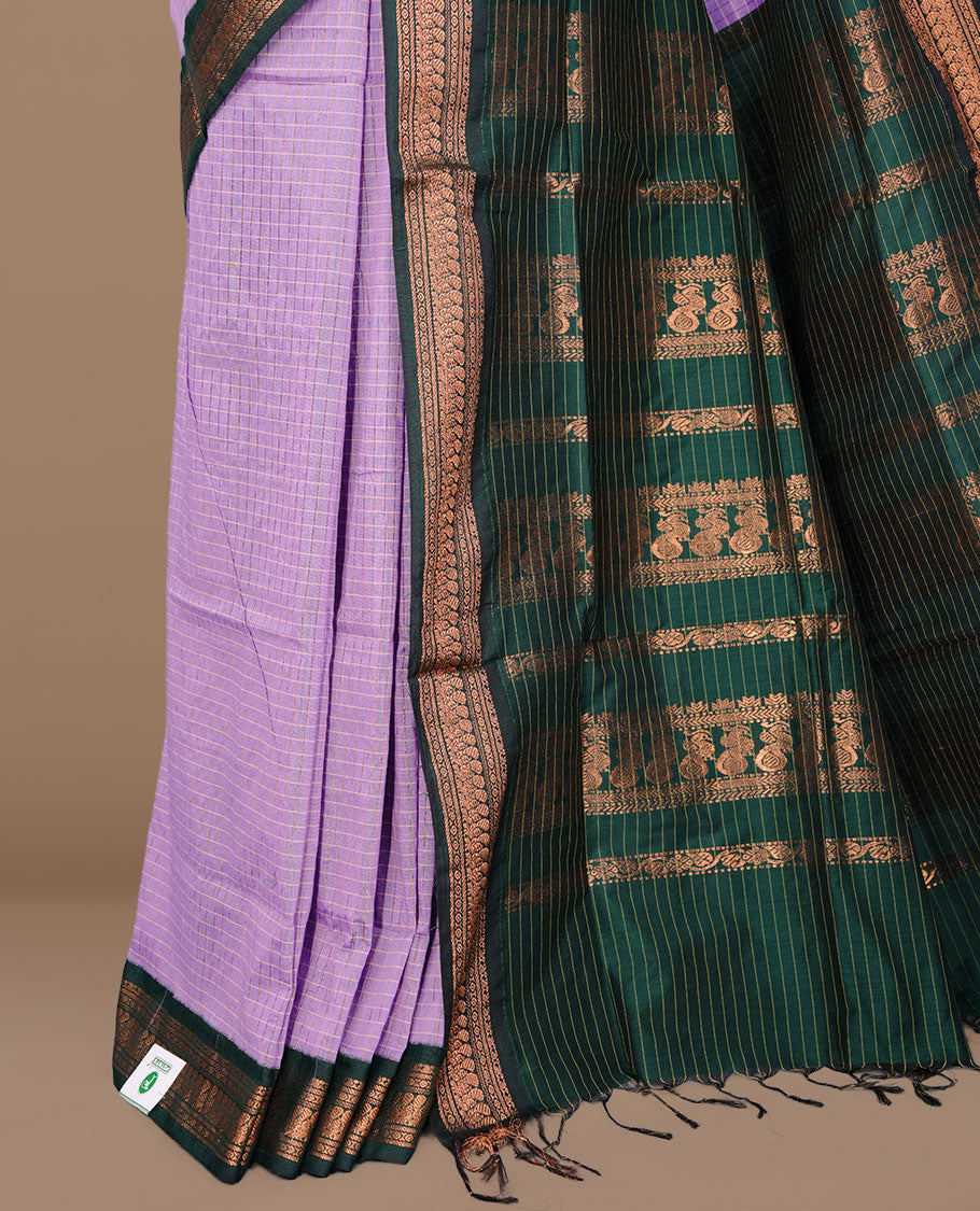 Lavender colour kalyani cotton saree featuring gold zari check pattern on body, complemented by green colour with Antique zari border, paired with matching blouse piece.