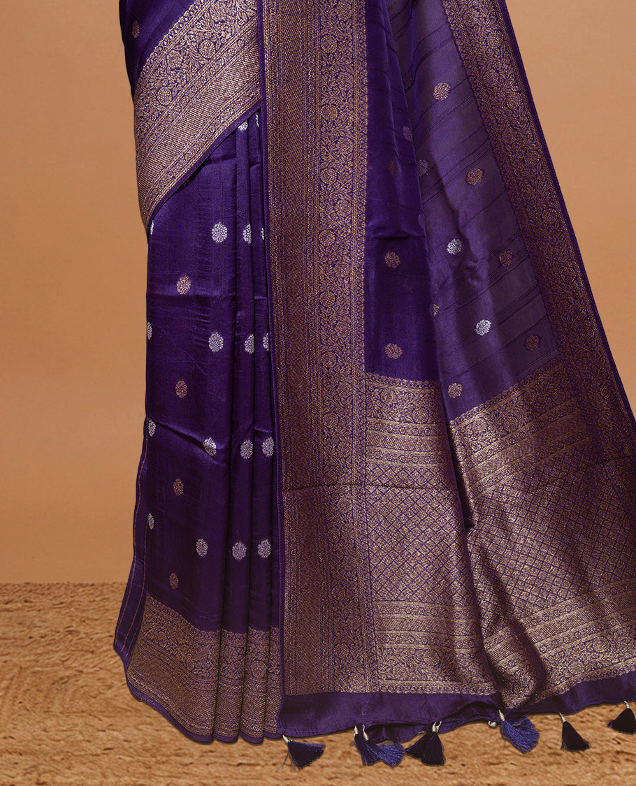 Violet colour Semi banaras tussar georgette Saree featuring Antique zari motifs on body, enhanced with antique zari border, paired with a matching blouse piece.