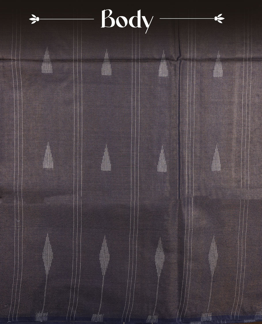 Dark blue colour semi jute saree highlighting gold zari stripped body with white motifs, without border and paired with matching blouse.