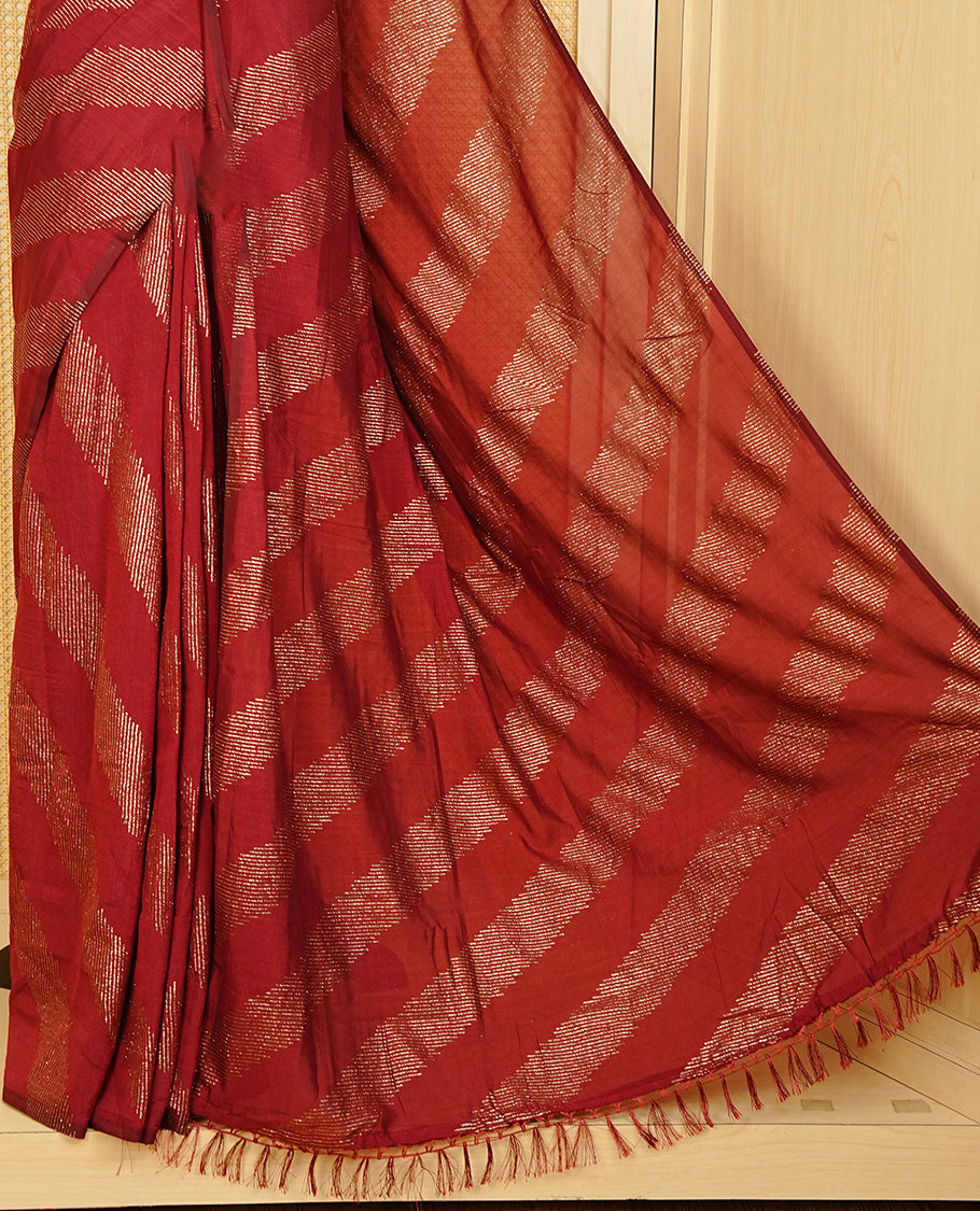 Maroon colour Vijitra silk Saree Featuring Leheriya style gold Printed body, complemented by contrast pallu & tassels